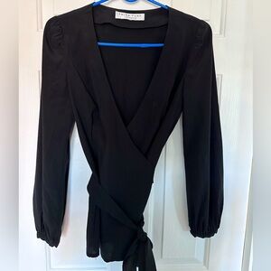 Trina Turk black wrap blouse
